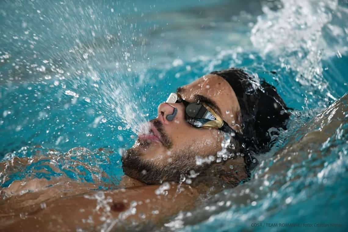 UPDATE/ Robert Glință, la un pas de podium în finala de 50 de metri spate, după descalificarea înotătorului de pe primul loc